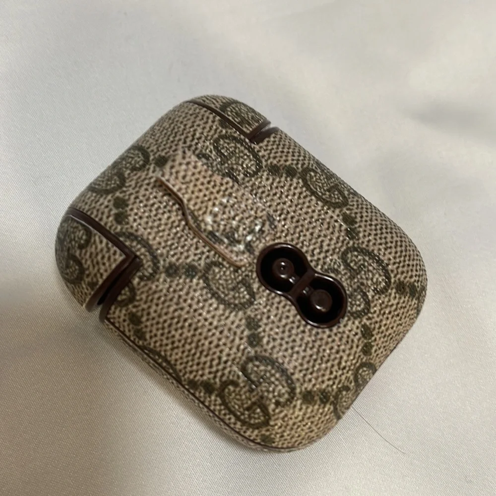 Gucci (fake) iphone 12promax phone case and matching airpod case